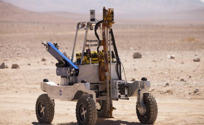 KREX-2-rover-carrying-a-drill-and-robotic-arm.-Credit-NASACampoAltoV.-Robles