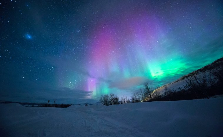 The best places to catch a glimpse of auroras is in the so-called 'auroral zone' near the magnetic poles.